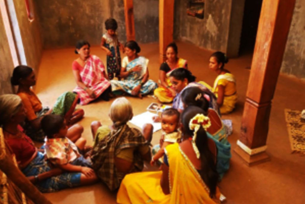 Women in rural areas of India having a meeting as part of Social Protection activities