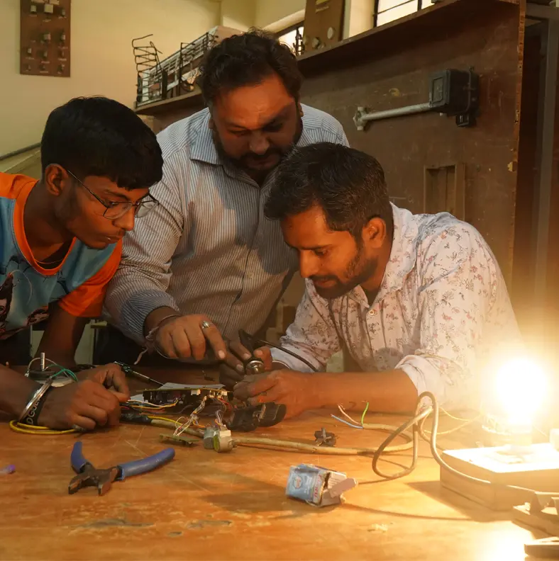 Students studying in skill training centre for electrical and electronics training which is part of the programme of Loyola Vocational Institute a partner of Caring Through Sharing