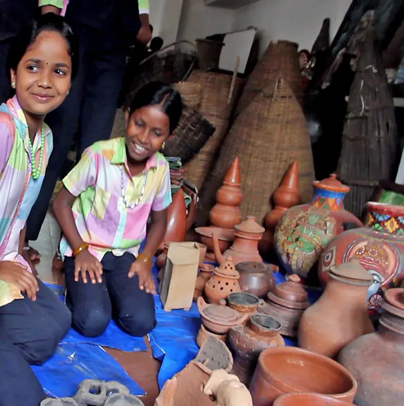 Children enjoying their rich heritage being preserved in a museum