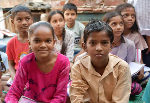 Studens studying in a tution centre , part of a partner program of JRDS