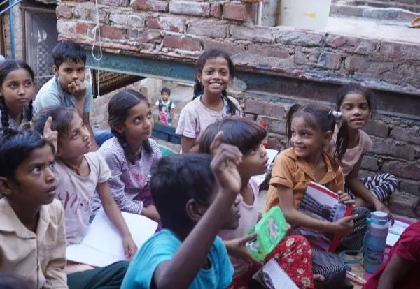 Students studying in a rural slum area study centre part of a project of Loyola Vocational Institute a partner of JRDS- Development Programs in India